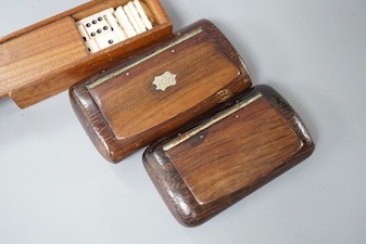 Two carved wood snuff boxes and a cased bone domino set